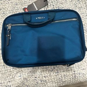 Tumi Madina Travel Cosmetic bag. NWT
